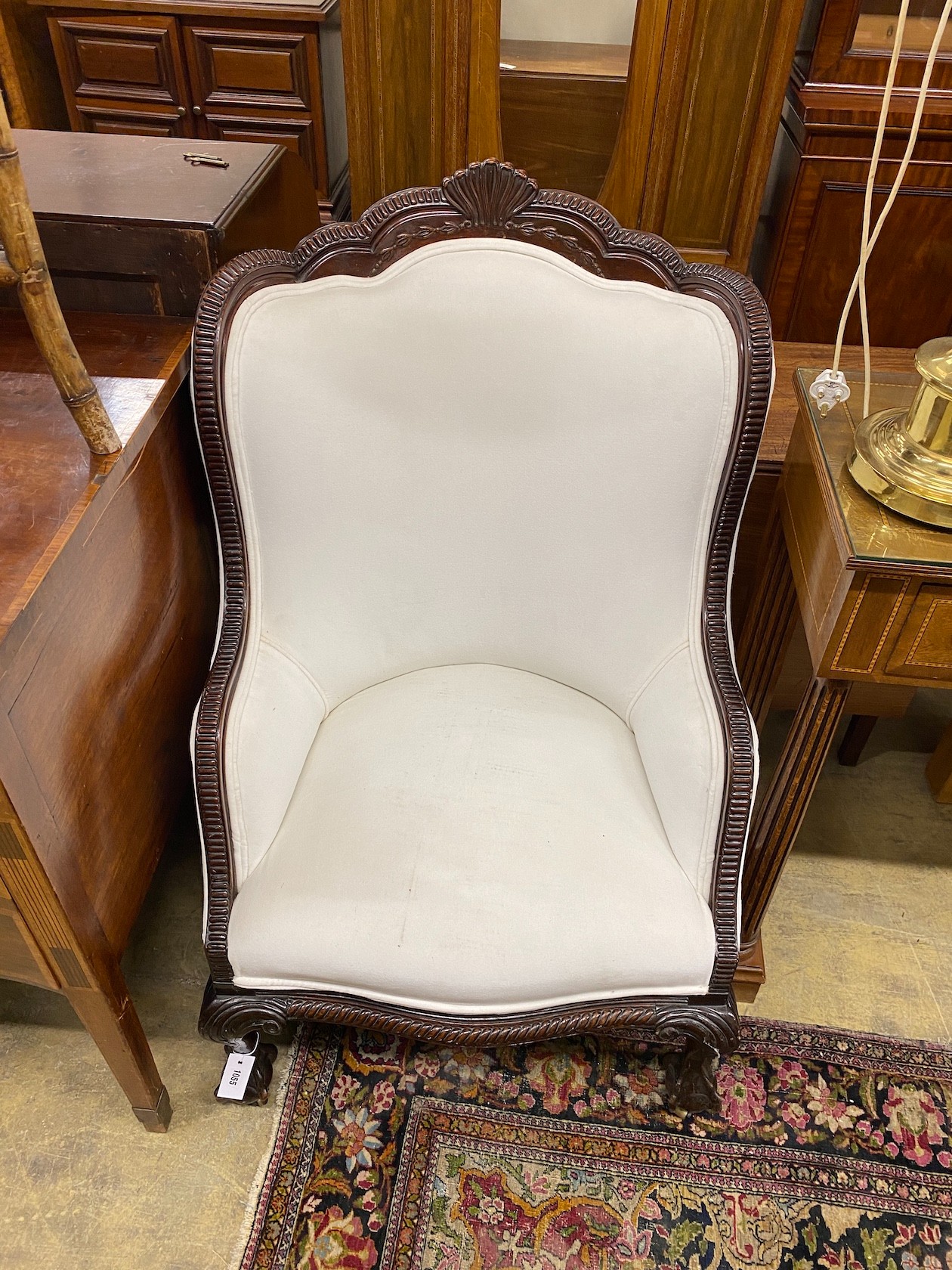 A Victorian carved mahogany armchair, width 70cm, depth 66cm, height 110cm